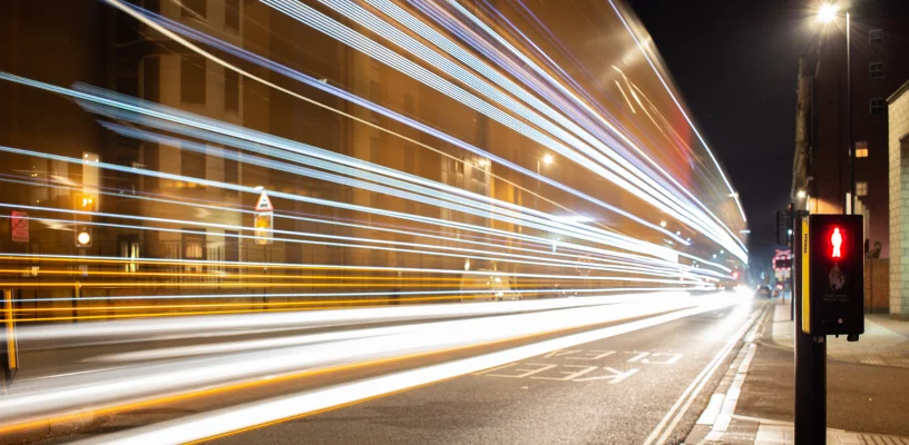 Bus moving fast on road