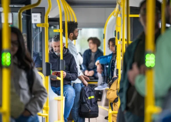 Passengers on a full bus